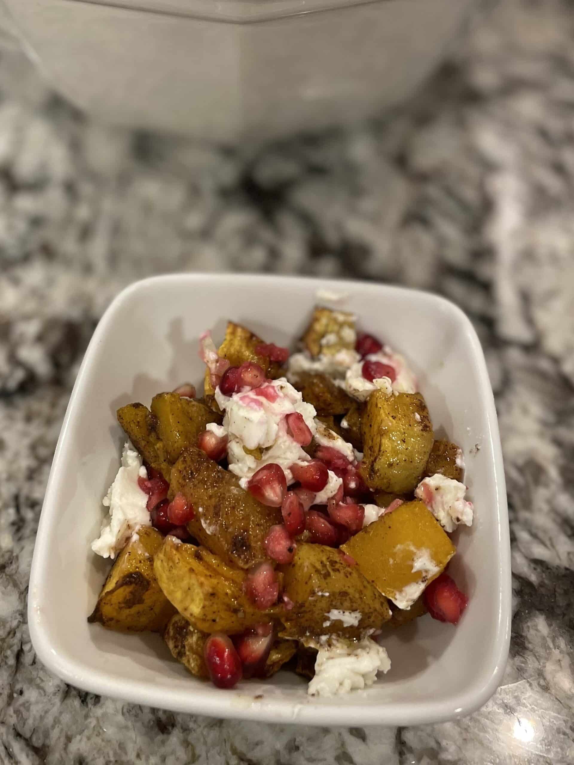 Butternut squash with pomegranate and goat cheese