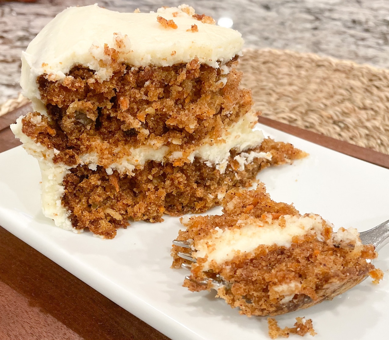 Slice of Carrot Cake on a White Plate with Fork