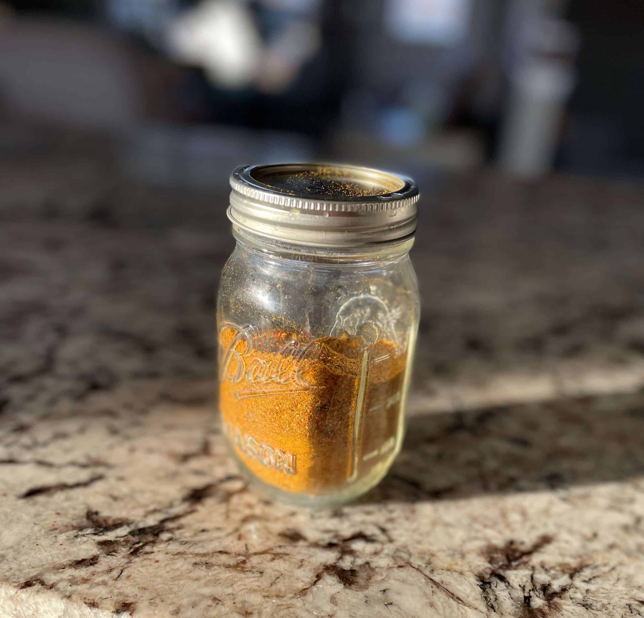 Homemade Chipotle Powder stored in a mason jar