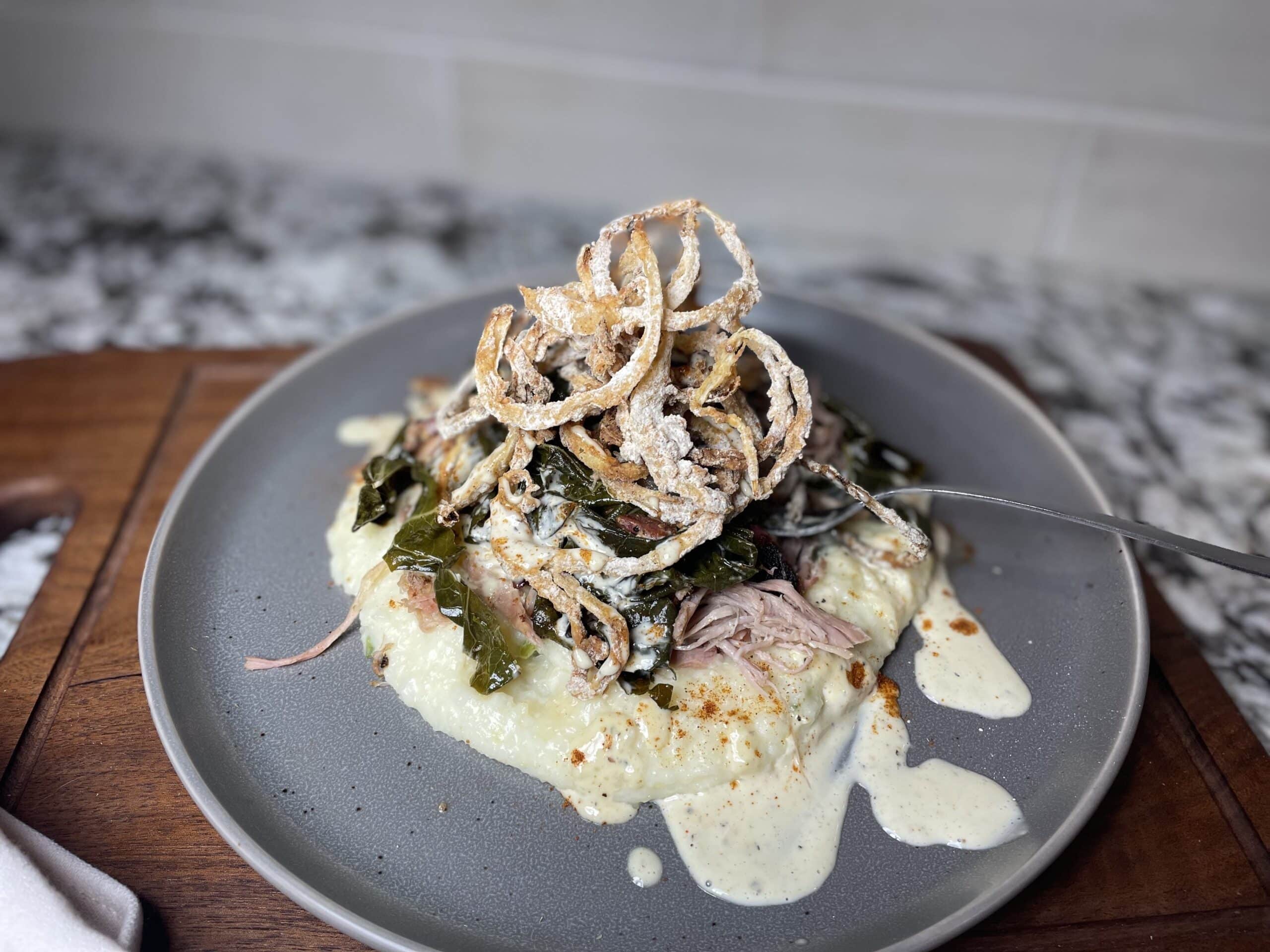 Pulled Pork, Cheesy Grits, and Collard Greens: A Southern Feast Inspired by Saw’s Soul Kitchen