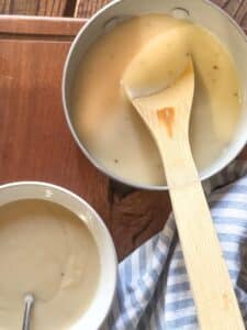 Cream of Chicken Soup in Bowl and Sauce Pan