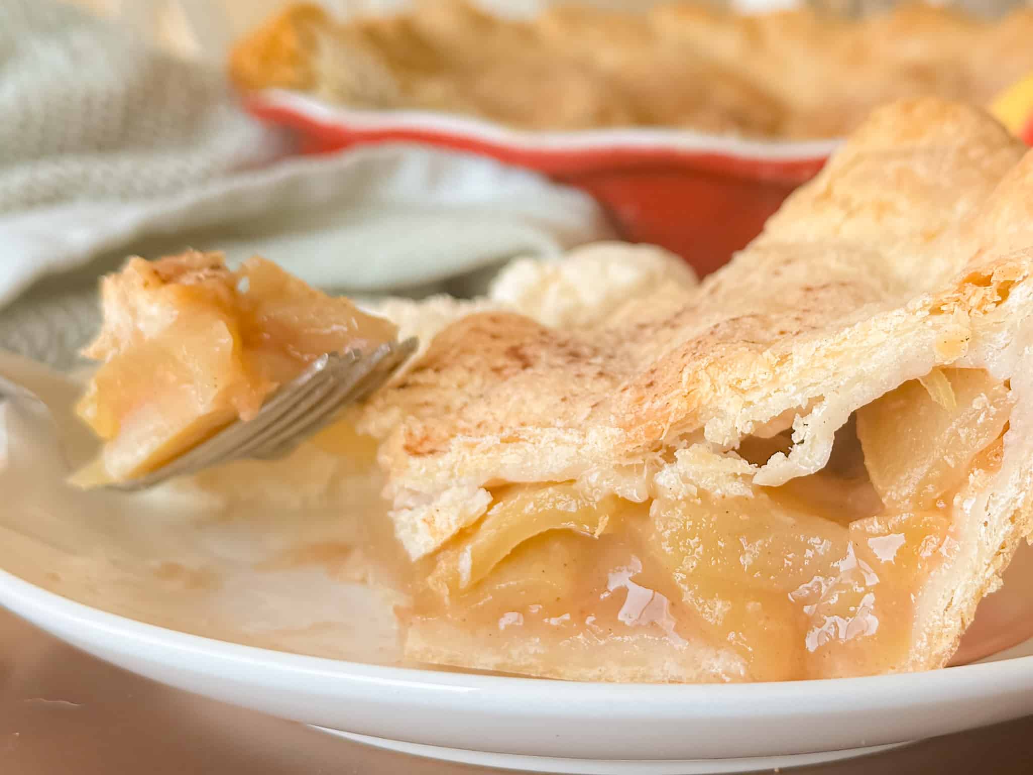 Slice of Apple Pie Showing the Flaky PIe Crust
