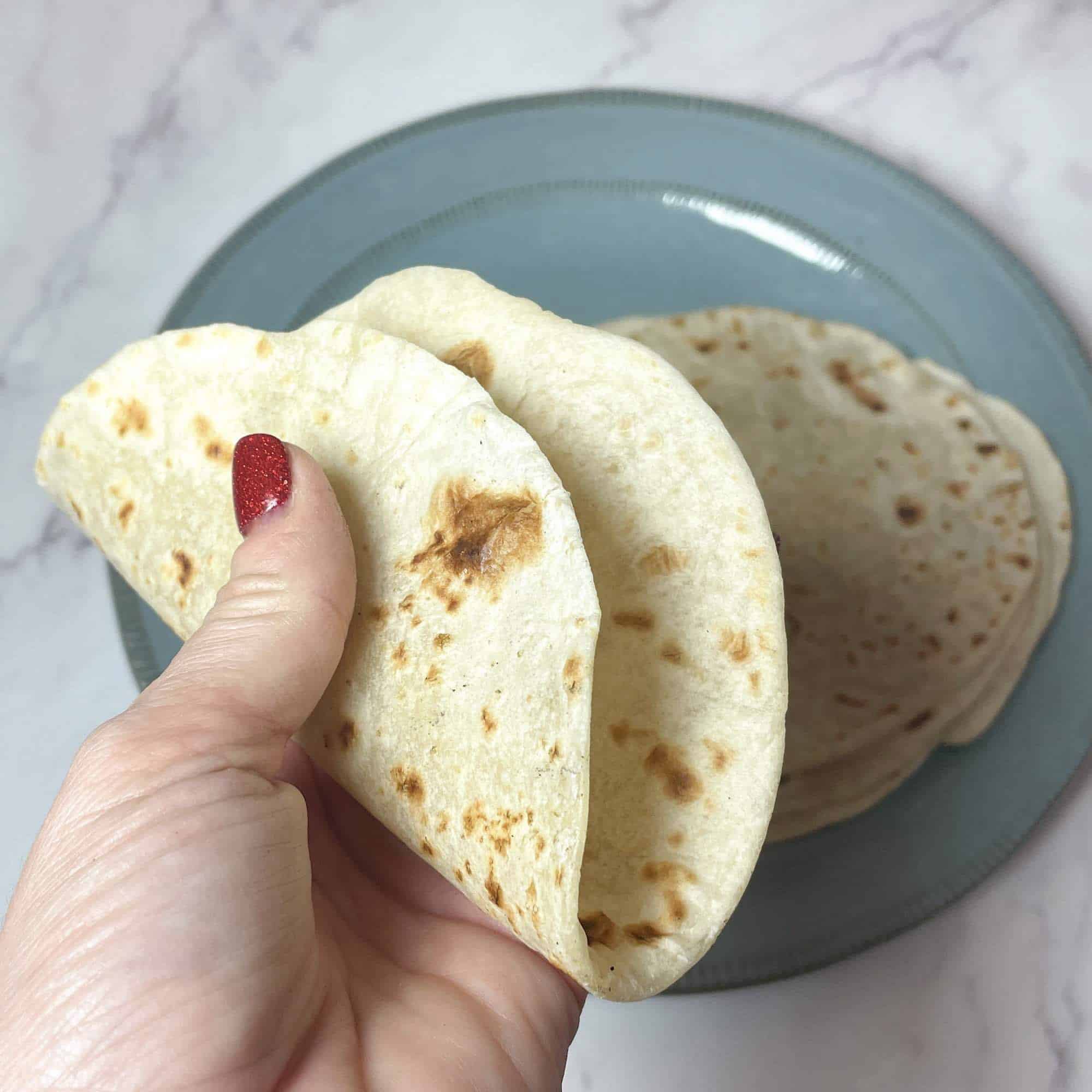 Hand Folding a Flour Tortilla