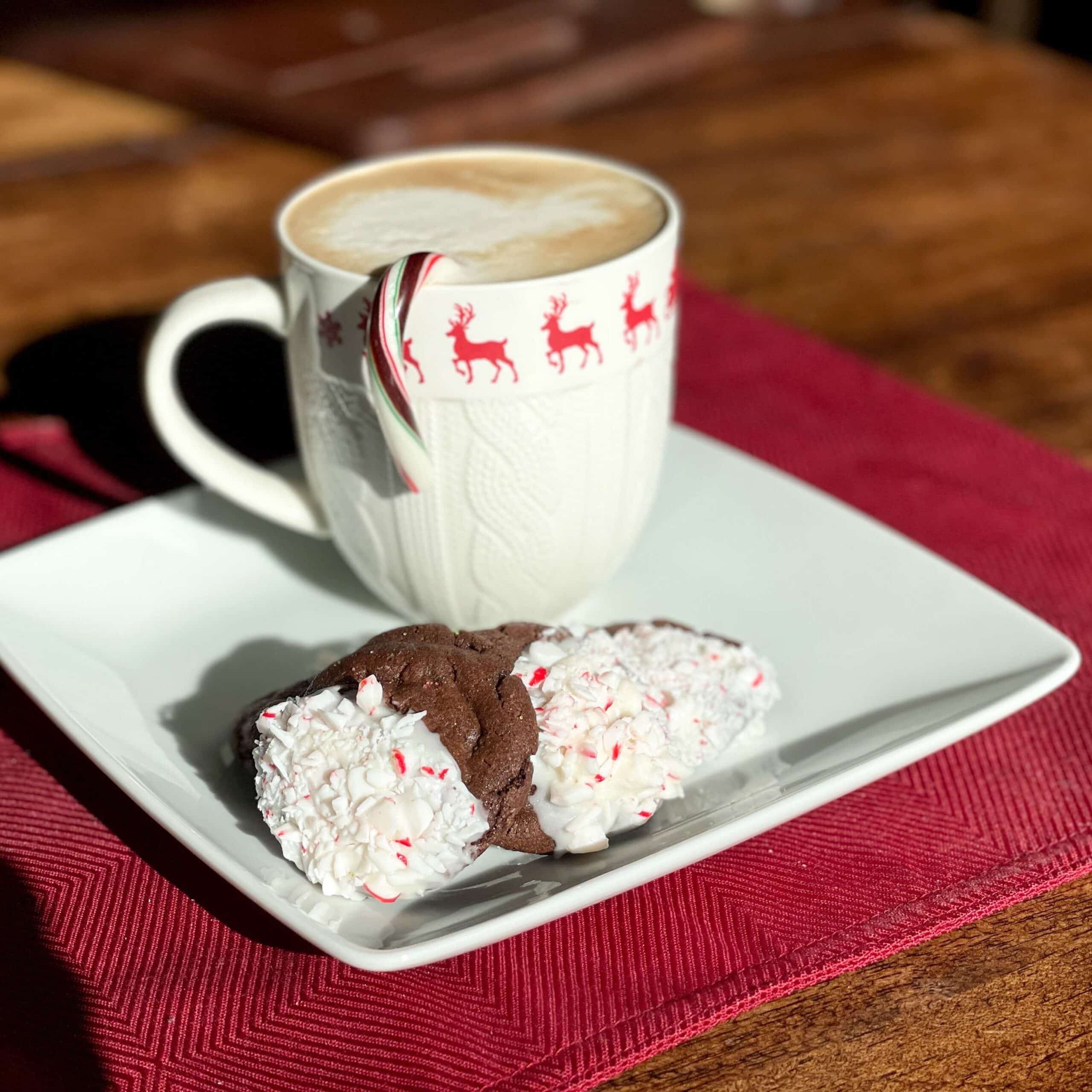Peppermint Mocha christmas cookies with Peppermint Mocha Latte on a white plate with a red placemat