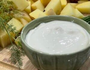 Greek Yogurt Mayonnaise in Greek Bowl with Potatoes
