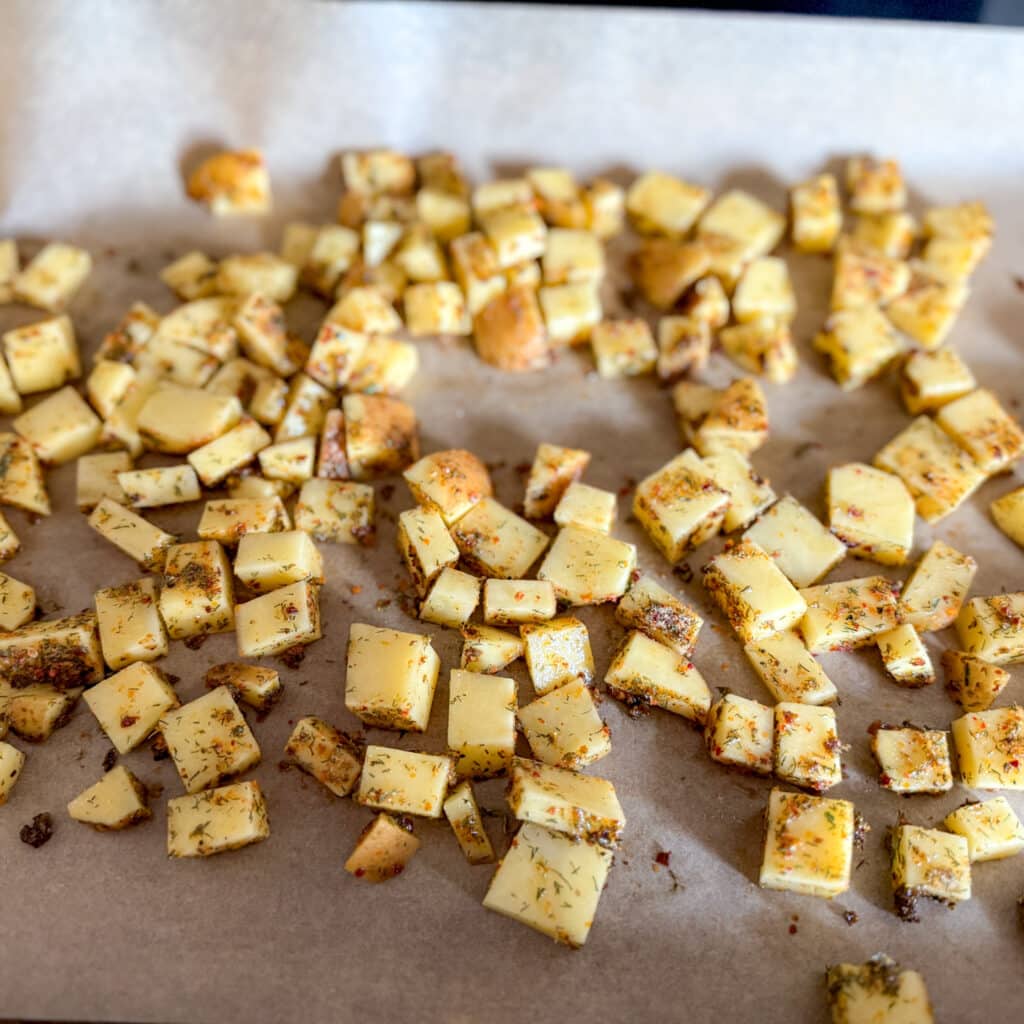 Seasoned Breakfast Potatoes on Baking Sheet