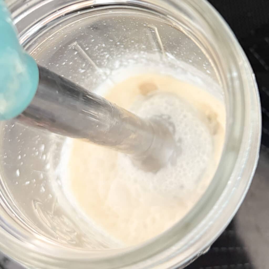 Brown Sugar Cold Foam Being Mixed in a Mason Jar