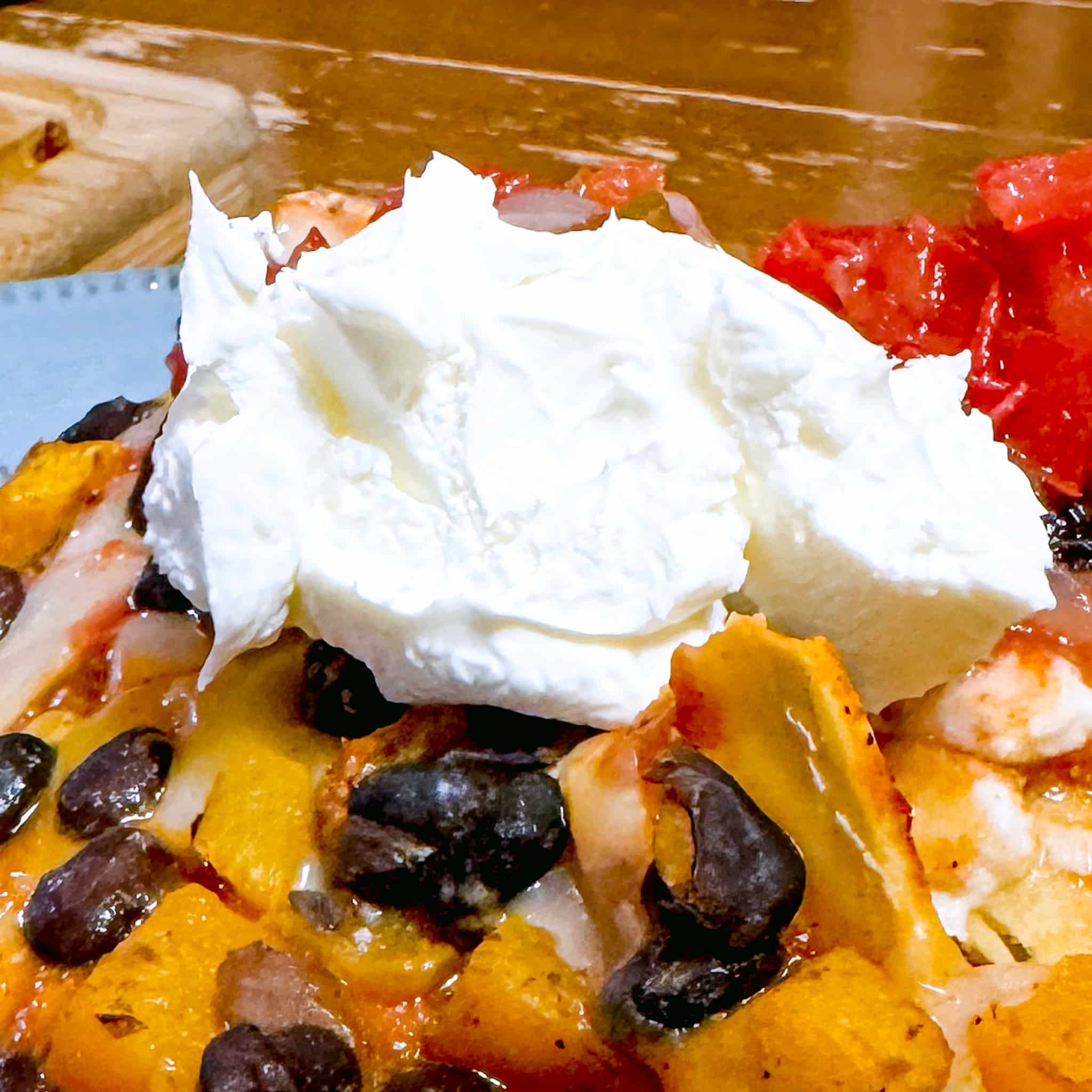 Sour Cream on Enchiladas