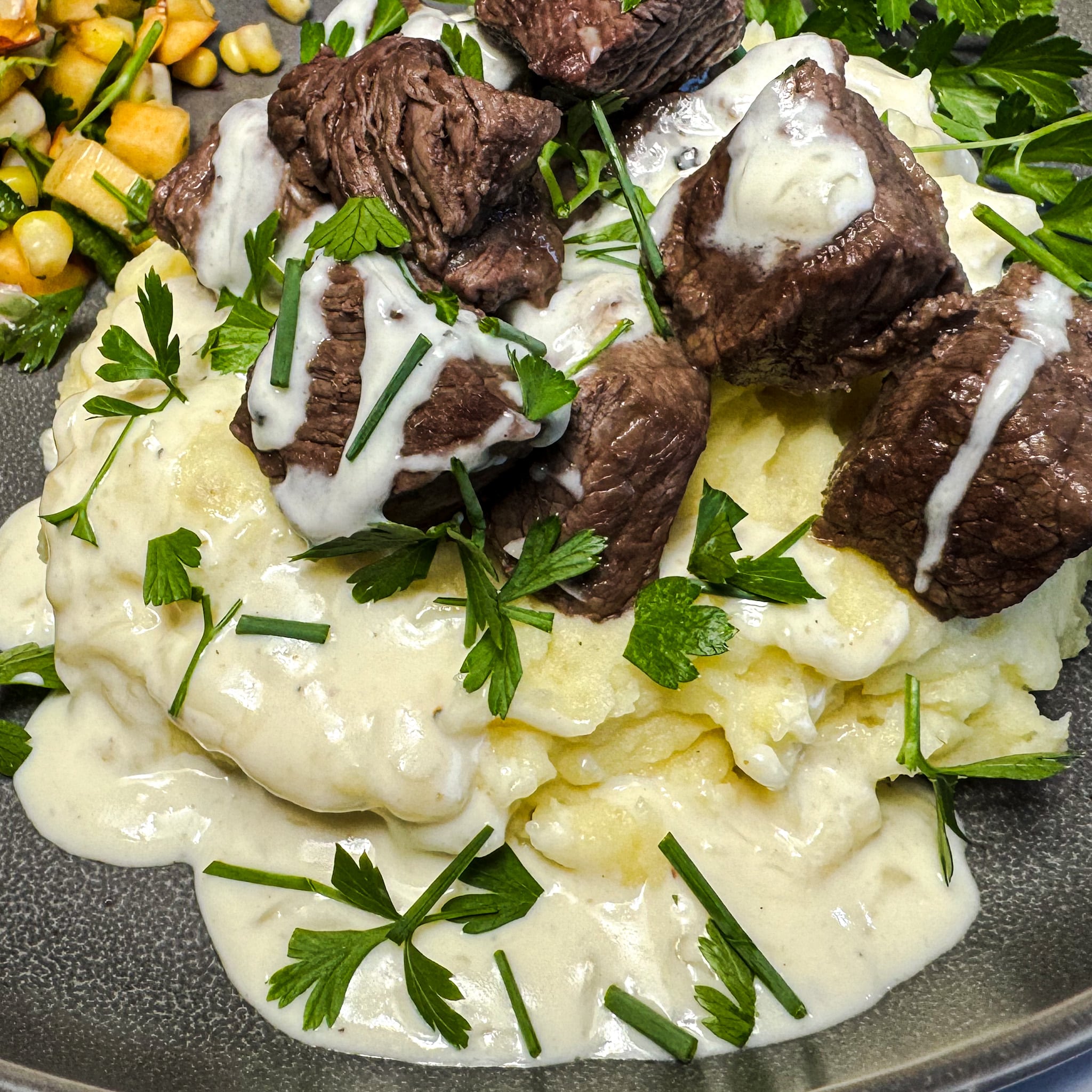 Parmesan Steak Bites with Roasted Garlic Mashed Potatoes