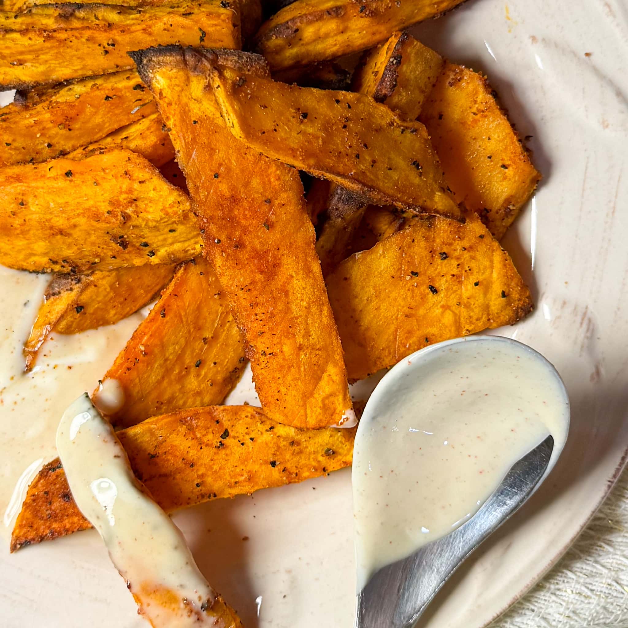 Sweet Potato Wedges On A White Plate