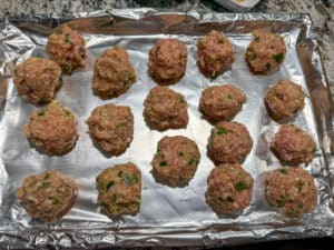 Cherry Jalapeno and Goat Cheese Meatballs Formed on Cookie Sheet