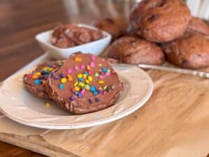 Cosmic Brownie Bagel with Sprinkles on a Plate