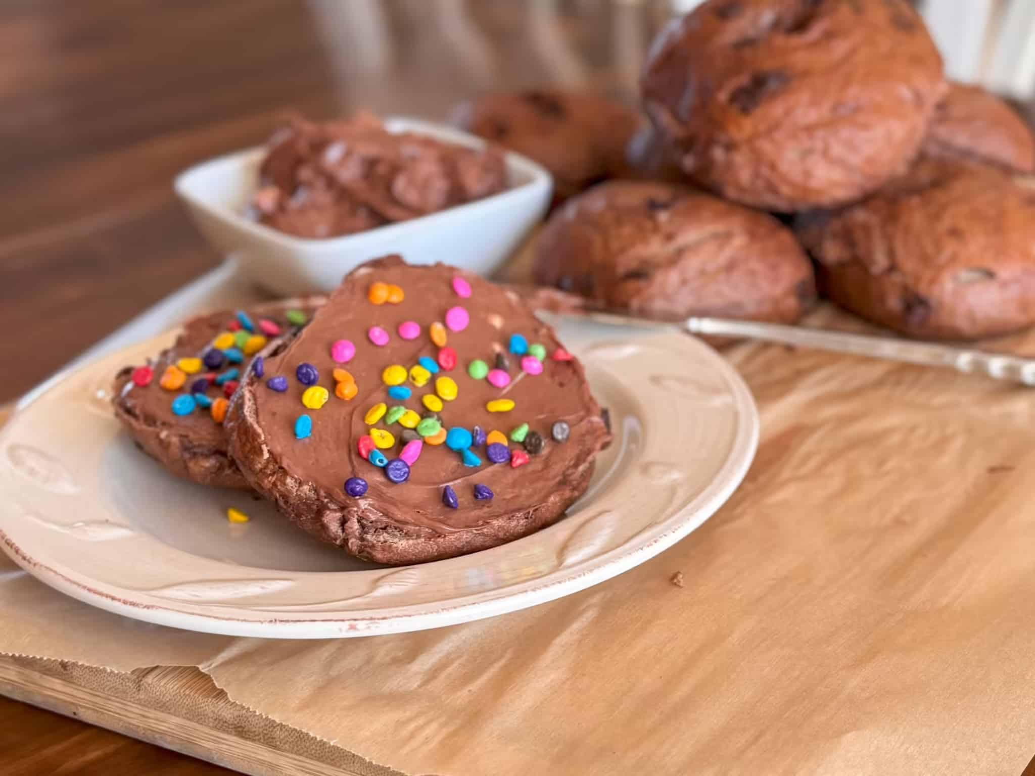 Cosmic Brownie Bagel with sprinkles on a plate
