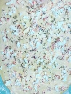 Cranberry Goat Cheese Dinner Roll Filling Spread on Dough