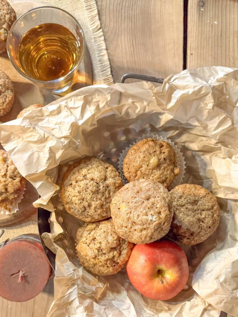Bowl of Hot Buttered Rum Apple Cider Muffins