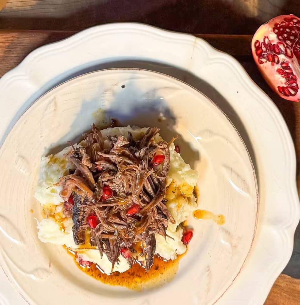 Pomegranate Pot Roast on Mashed Potatoes