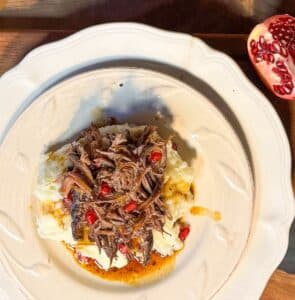 Pomegranate Pot Roast on Mashed Potatoes