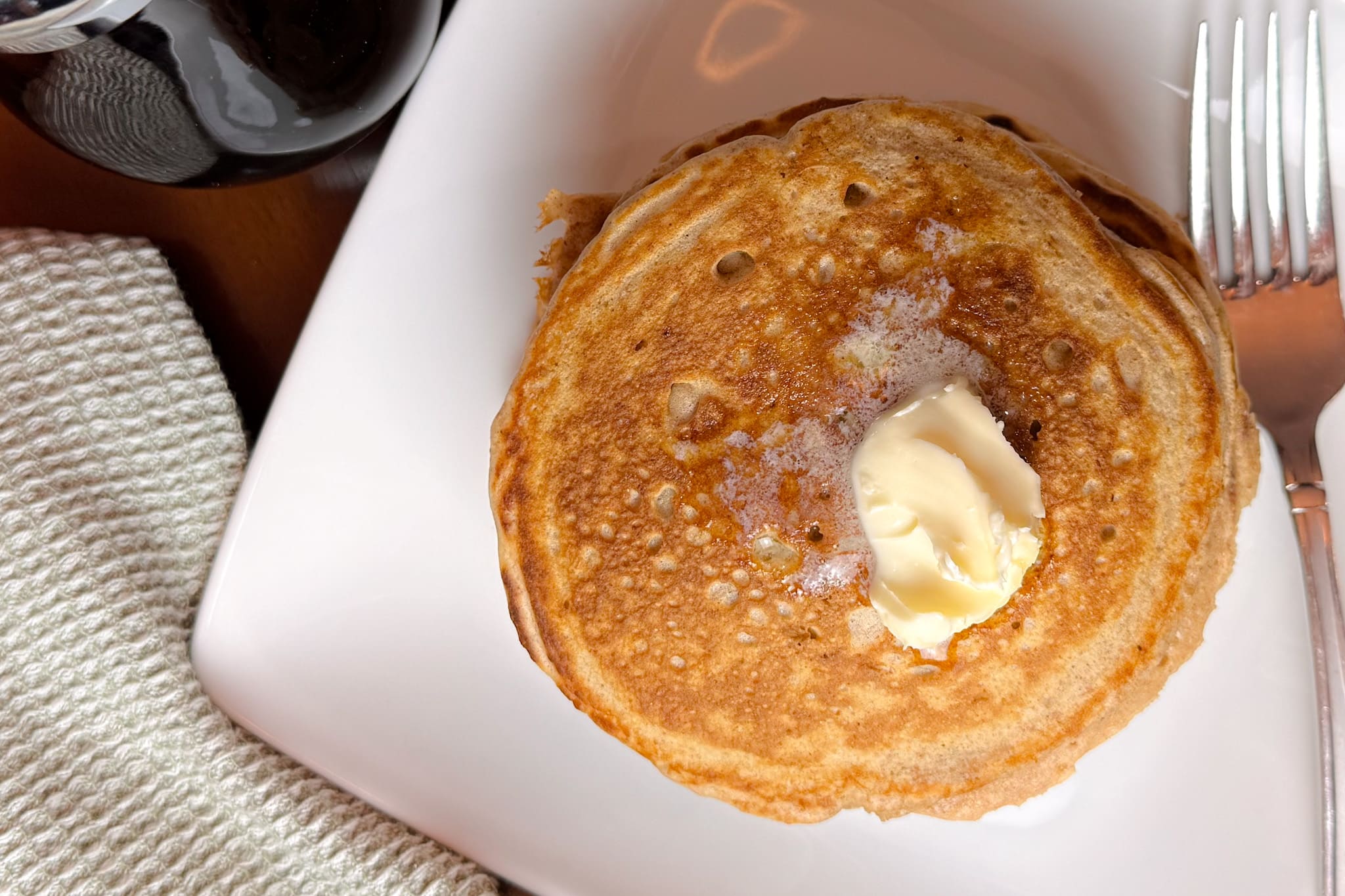 Pancakes On White Plate Overhead Shot