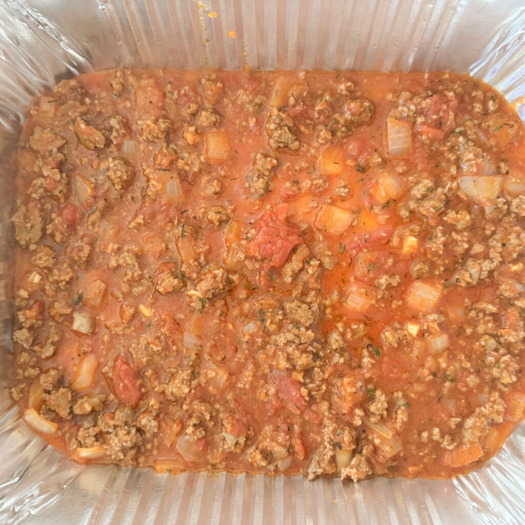 Bottom Meat Sauce Layer of Ricotta Lasagna in a Pan