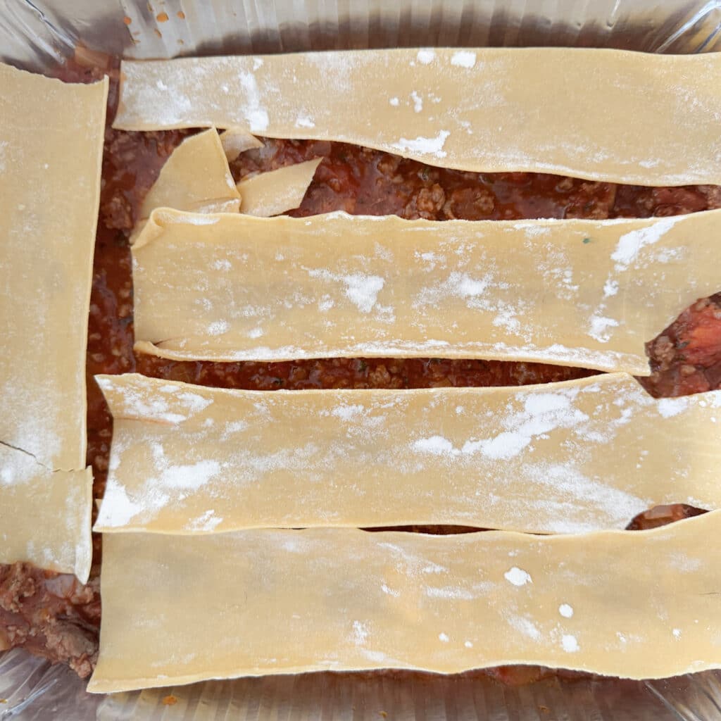 Lasagna Noodles on Top of Meat Layer for Ricotta Lasagna