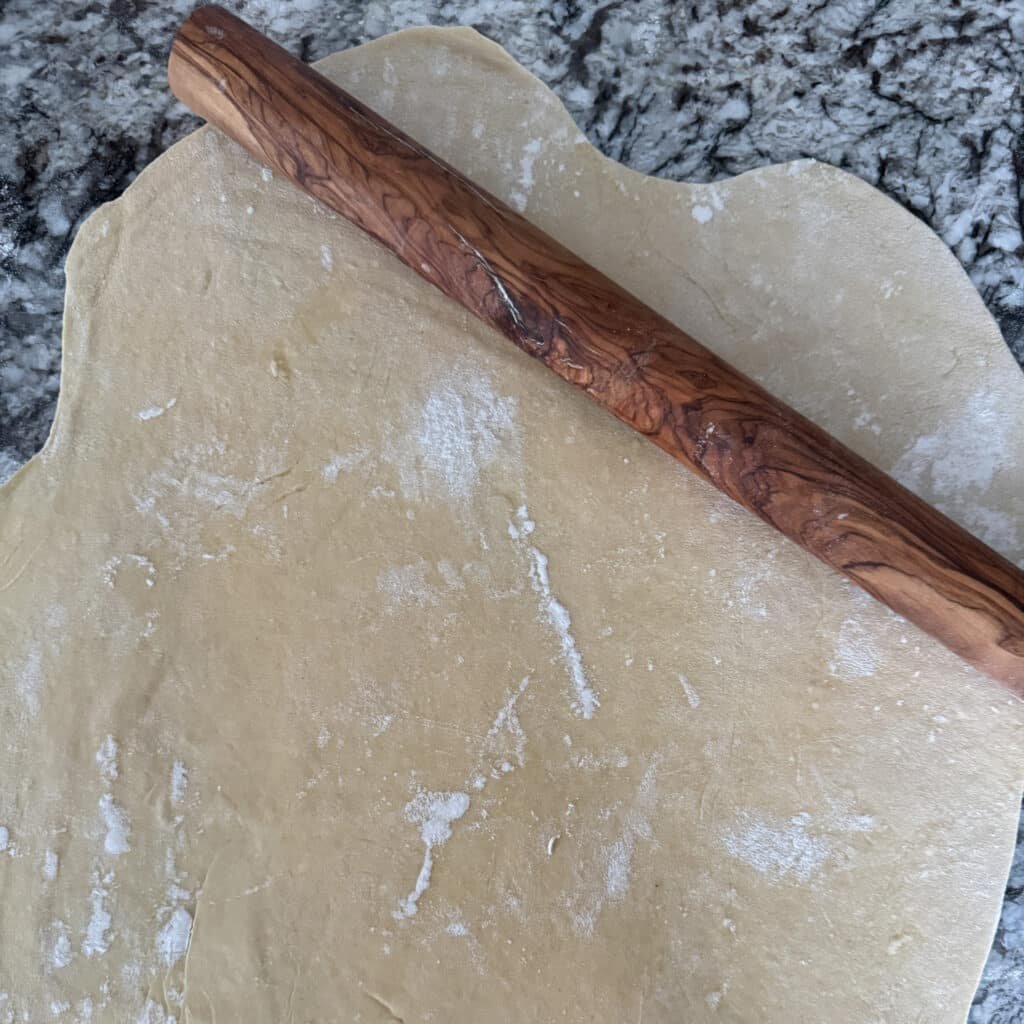 Egg Noodle Dough Rolled out with Rolling Pin