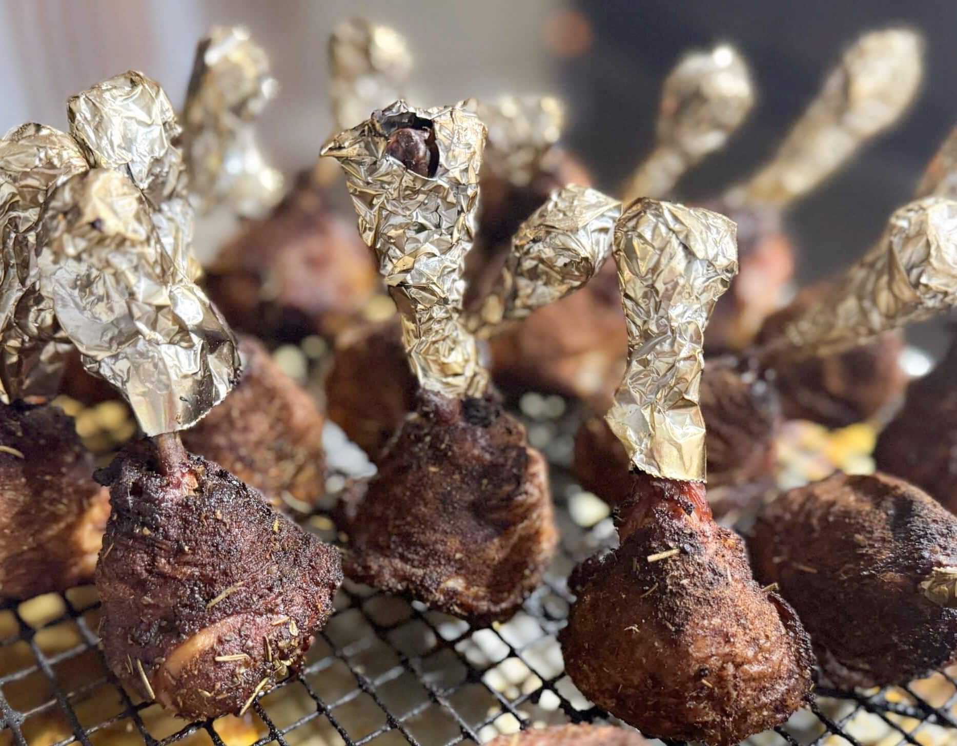 Smoked Nashville Hot Chicken Lollipops On a Grate