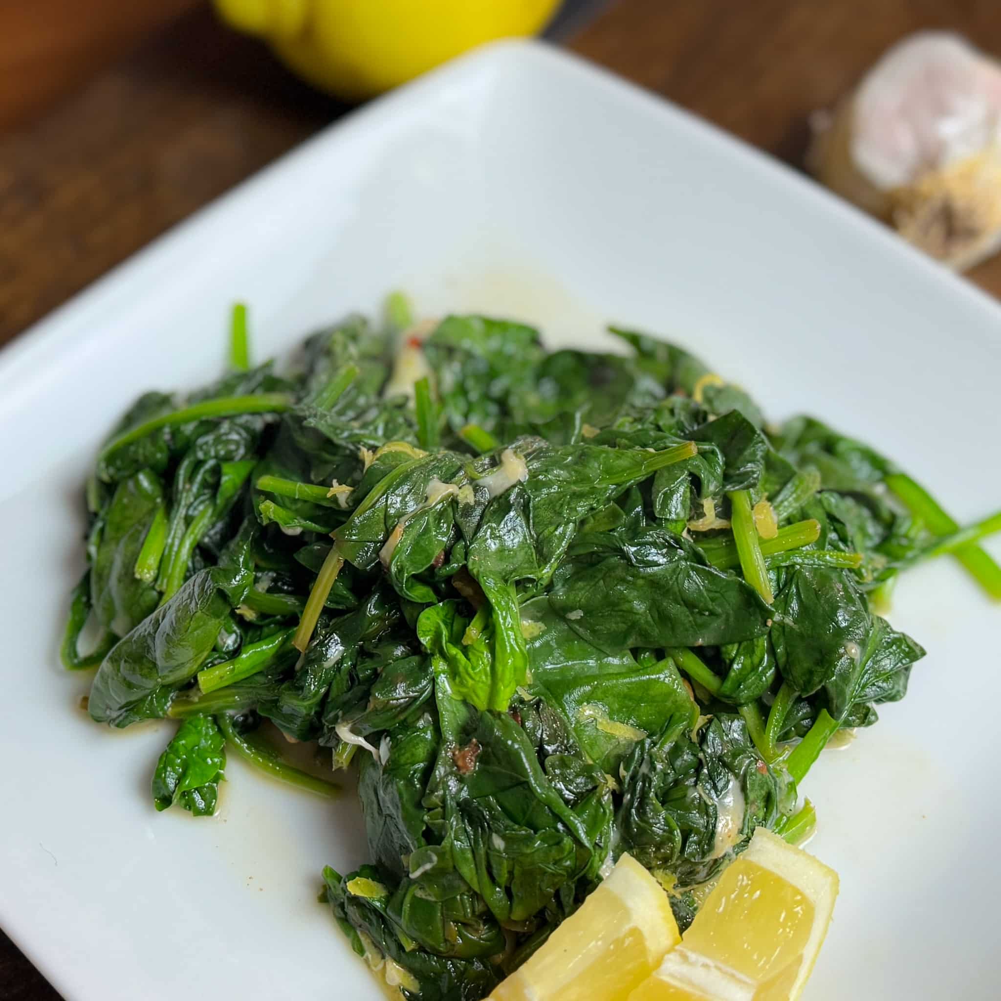 Sautéed Spinach With lemon slices
