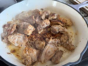 Browning Cajun Chicken Thighs in the Skillet