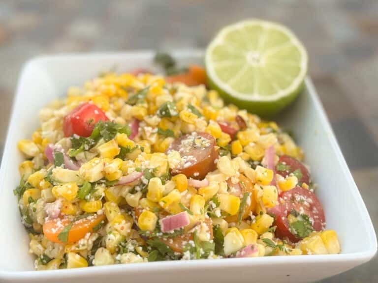 Corn Salad in a Bowl with Half a Lime