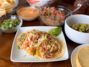 Baja Fish Tacos Surrounded by Toppings