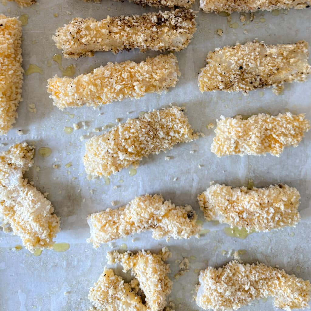 Breaded Fish Fingers on Cookie Sheet