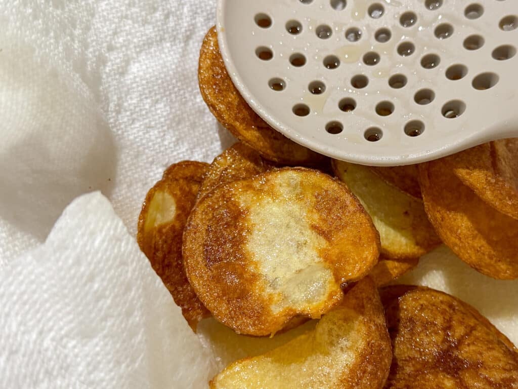 Draining Potato Chips on a Paper Towel