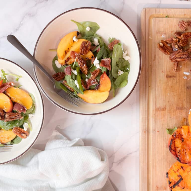 Two Arugula Salad with Peaches and Goat Cheese