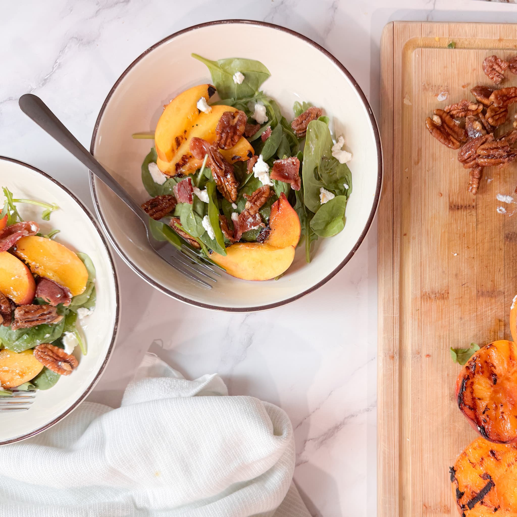 Two Arugula Salad with Peaches and Goat Cheese