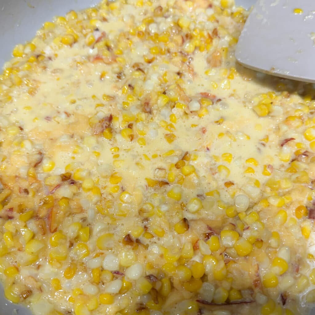 Add Cream to Jalapeño Peach Creamed Corn