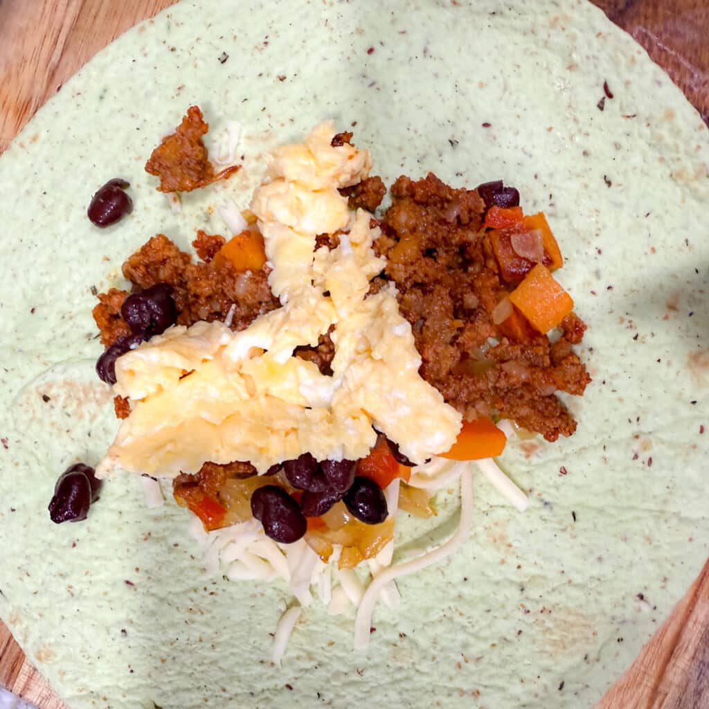 Spinach Wrap Topped with All the Ingredients