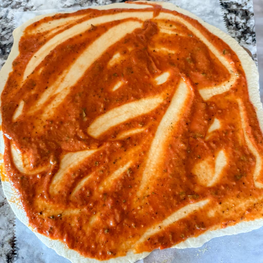 Pizza Sauce on Pizza Dough