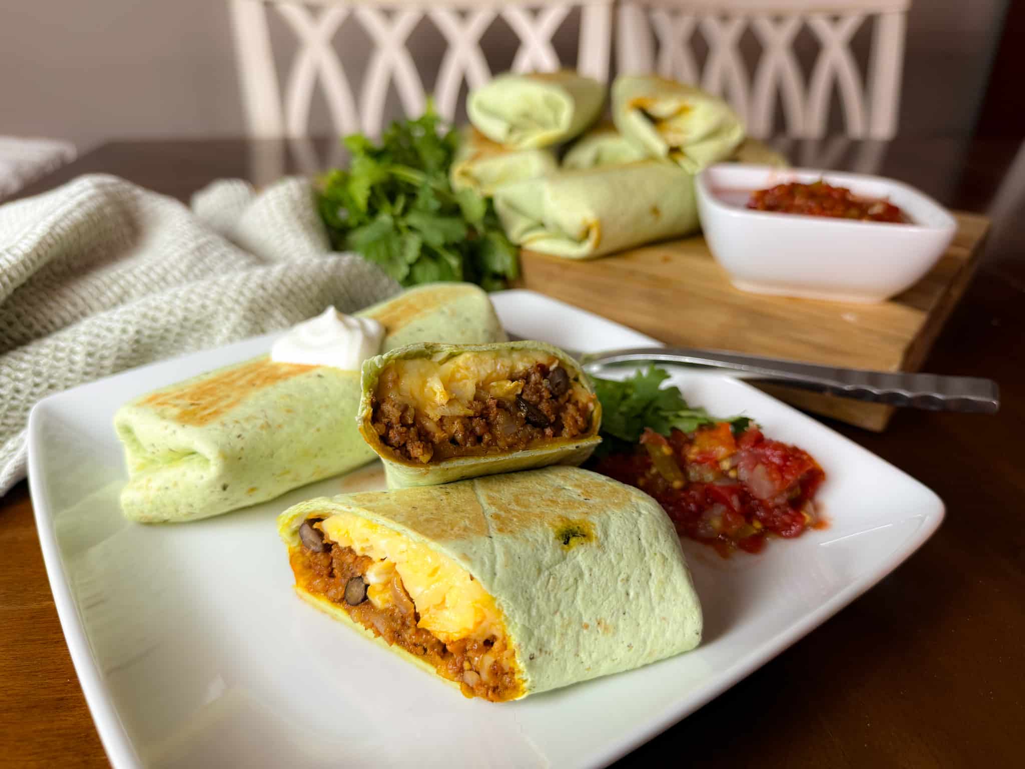 Sweet Potato Black Bean Breakfast Burritos Cut Open on a Plate