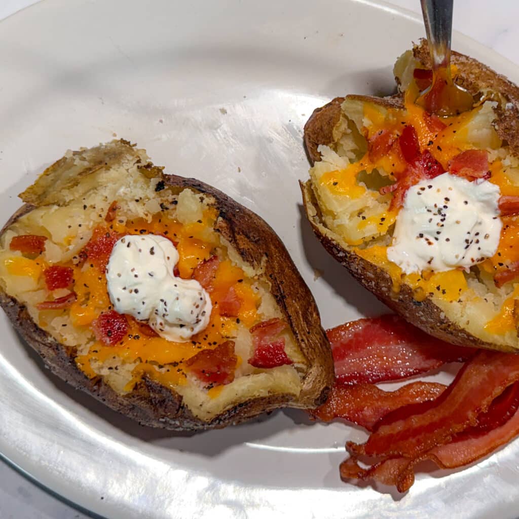 Smoked Baked Potato with Cheese, Bacon and Sour Cream