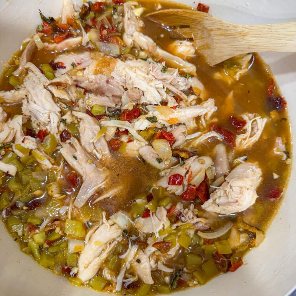 Add Poblanos and Chicken and Broth to Chicken and White Bean Chili