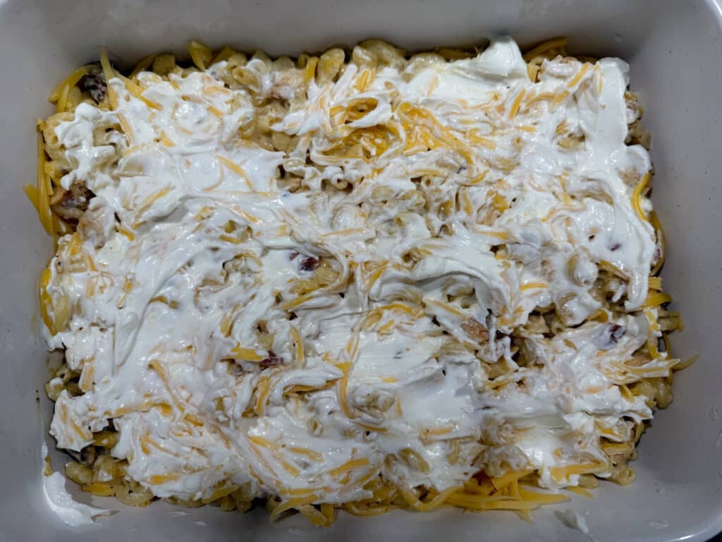 Sour Cream over Gouda and Macaroni in Casserole Dish