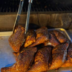 Bbq Chicken Quarters Coming off Smoker