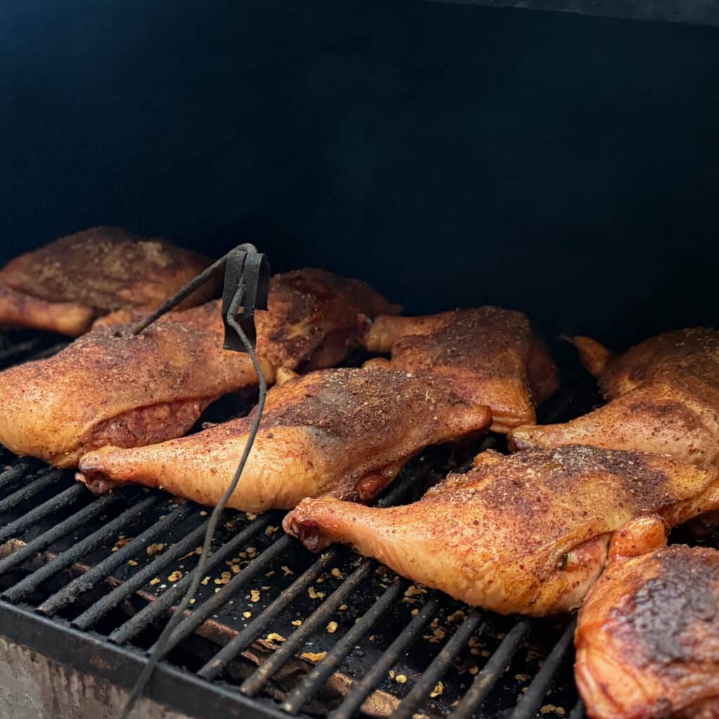Bbq Chicken Quarters on Smoker Ready for Glaze