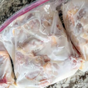 Chicken Quarters in Ziploc Bags Coated in Buttermilk Soak