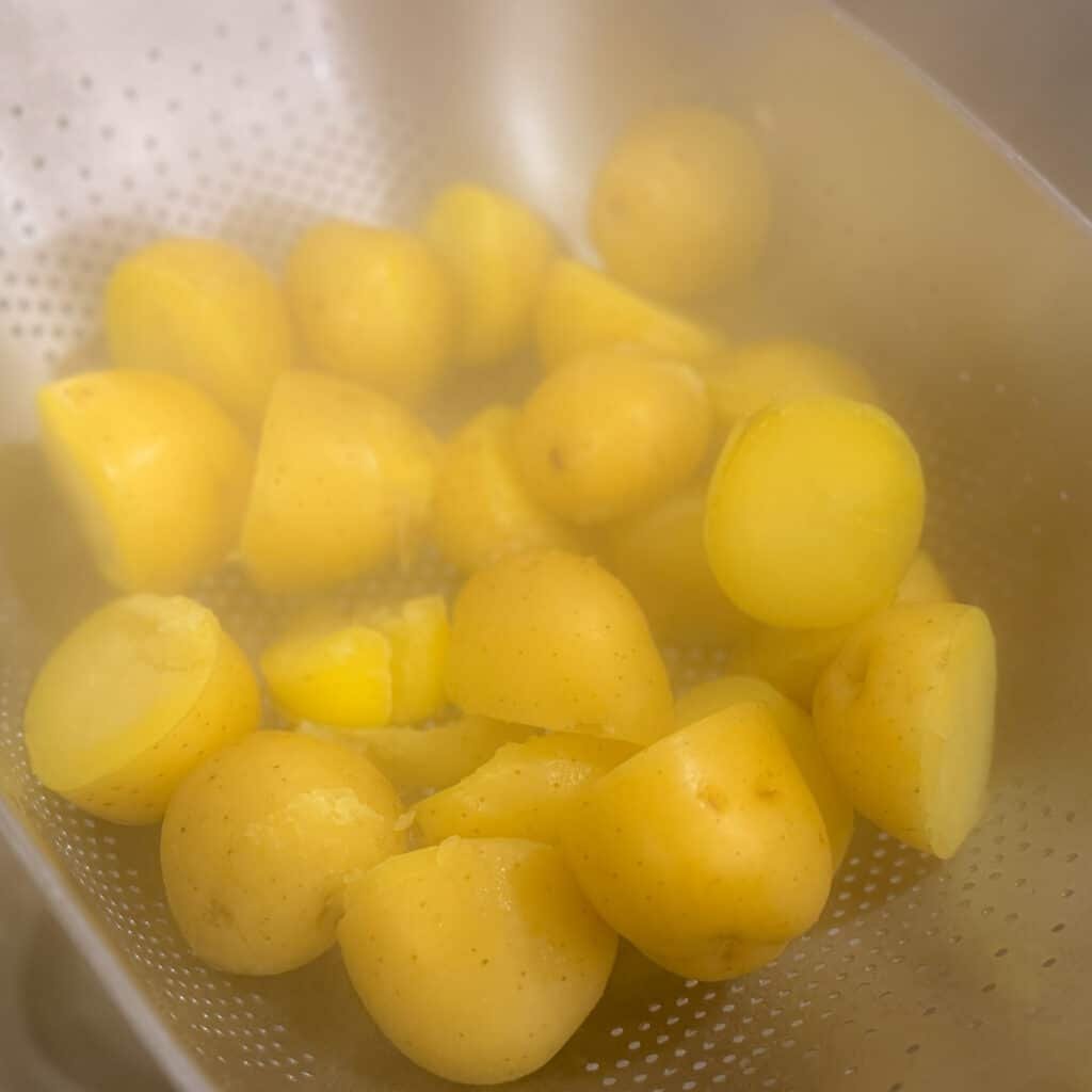 Draining Steamy Boiled Potatoes